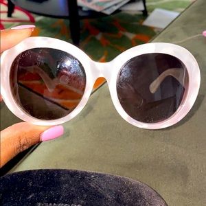 - Gucci sunglasses, with Gucci case